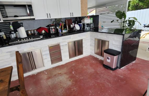 Modern outdoor kitchen with stone simulation