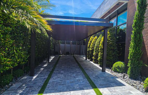 Long pergola with four columns and LED lighting system