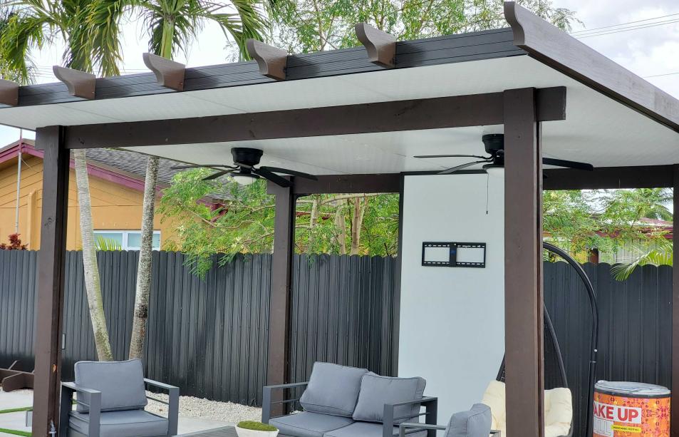 Imitation wood pergola with two classic style fans