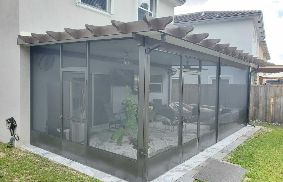 Aluminum terrace with antique finish wood simulation.