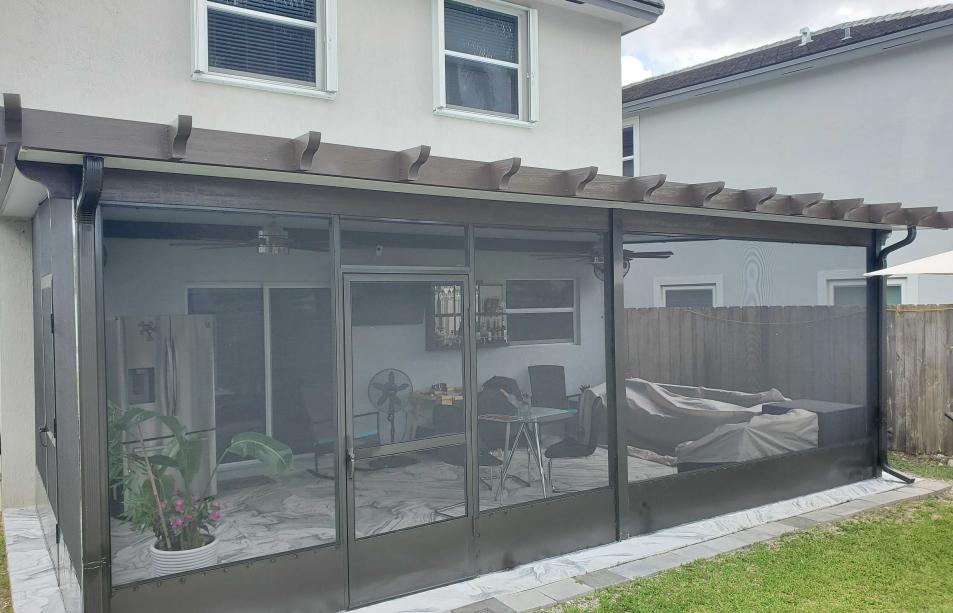 Aluminum terrace with antique finish wood simulation.