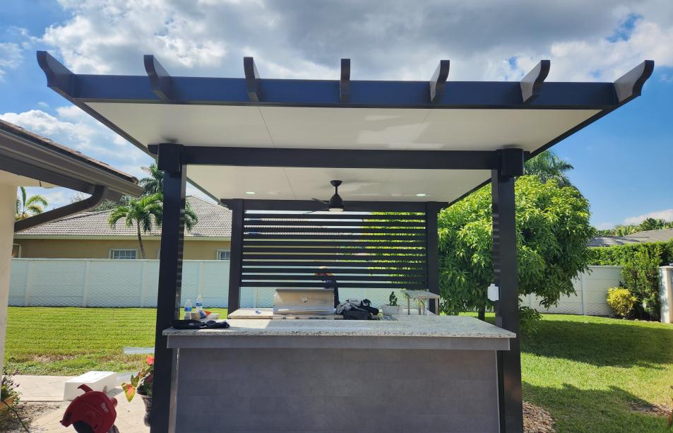 Small simulation wood pergola with outdoor kitchen included