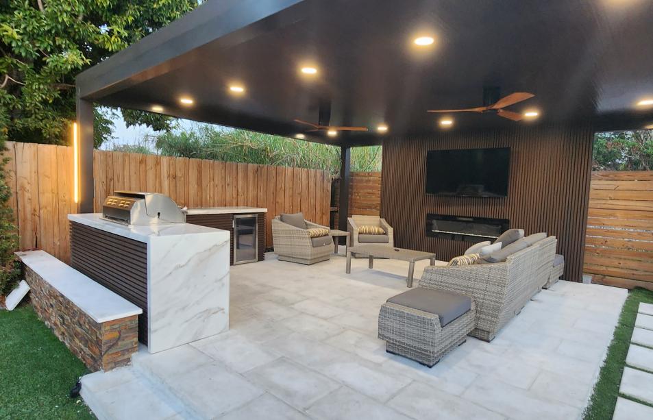 Modern aluminum pergola with outdoor kitchen and LED lighting system