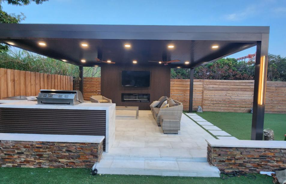 Modern aluminum pergola with outdoor kitchen and LED lighting system