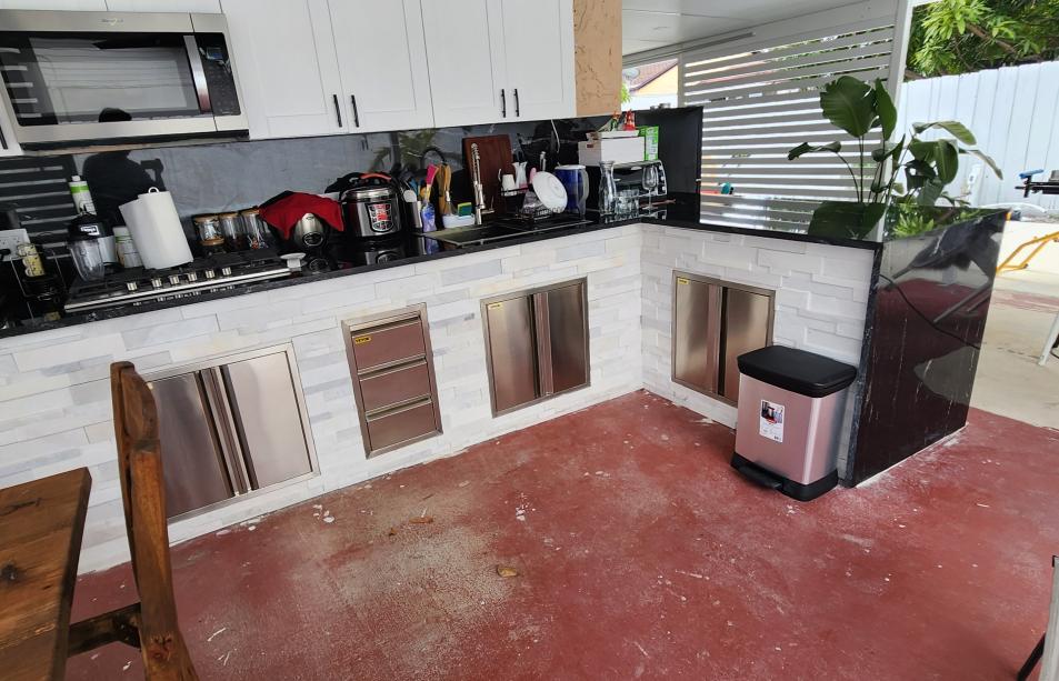 Modern outdoor kitchen with stone simulation