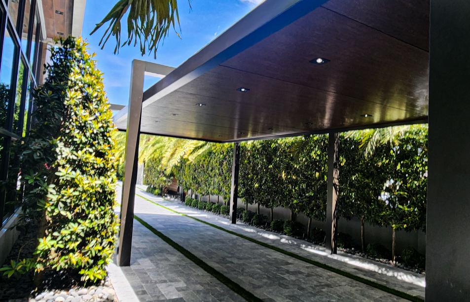 Long pergola with four columns and LED lighting system