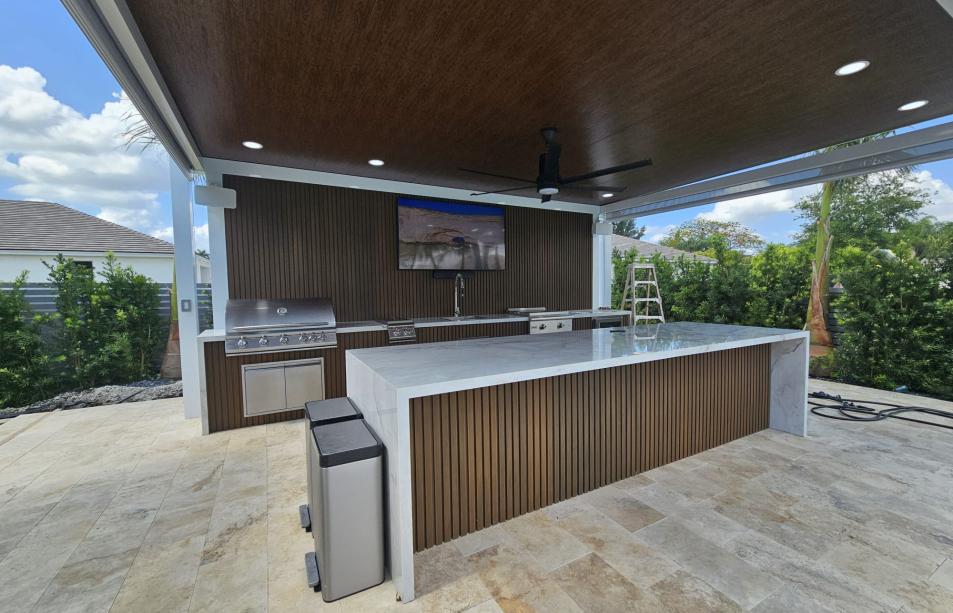 Modern pergola with imitation wood and outdoor kitchen