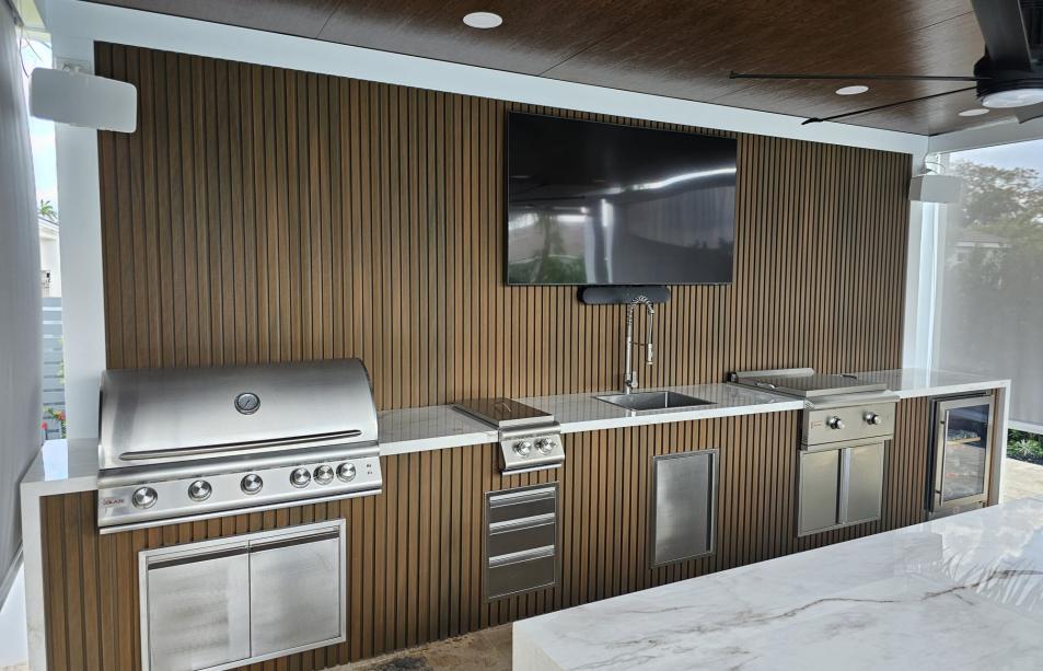 Modern pergola with imitation wood and outdoor kitchen