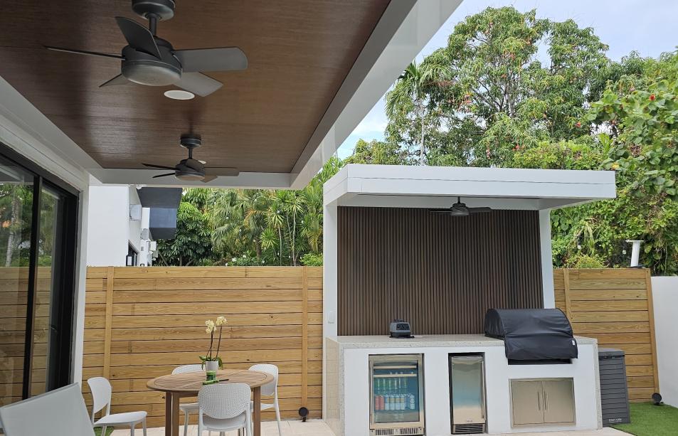 Terrace, pergola and outdoor kitchen set with predominant white color