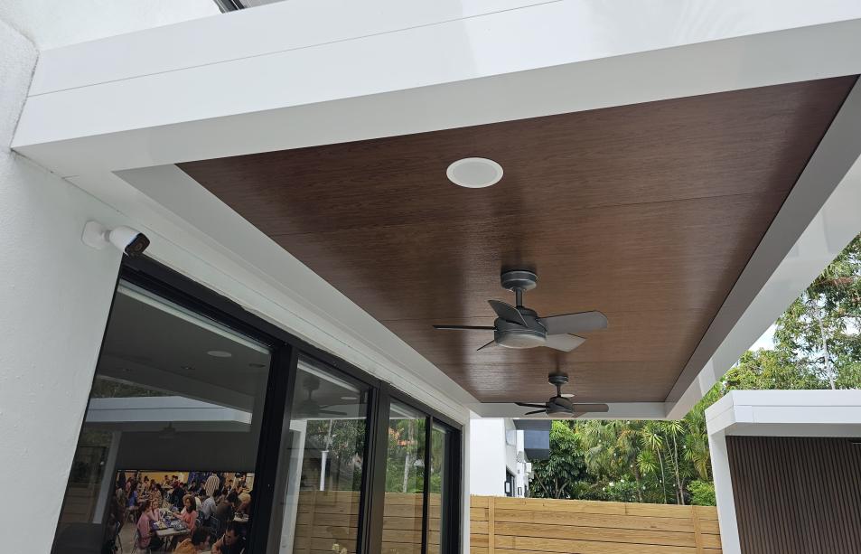 Terrace, pergola and outdoor kitchen set with predominant white color