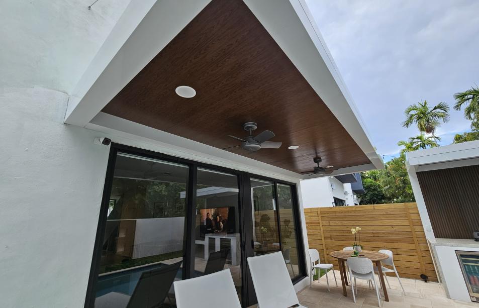Terrace, pergola and outdoor kitchen set with predominant white color