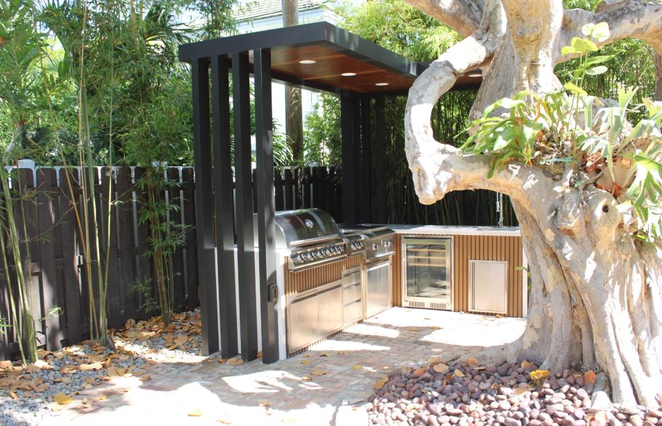 Stainless steel outdoor kitchen with narrow pergola