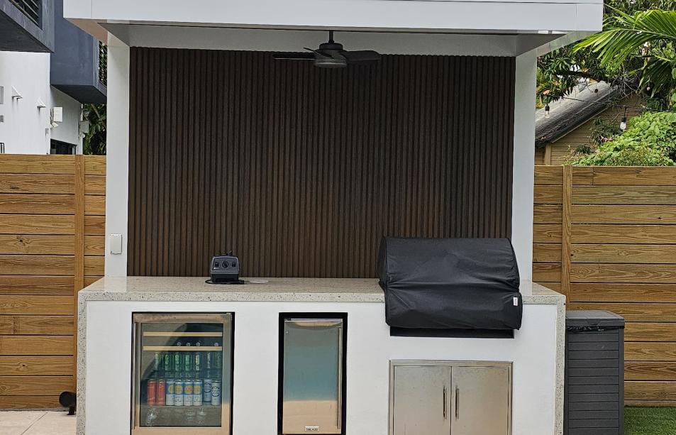 Terrace, pergola and outdoor kitchen set with predominant white color