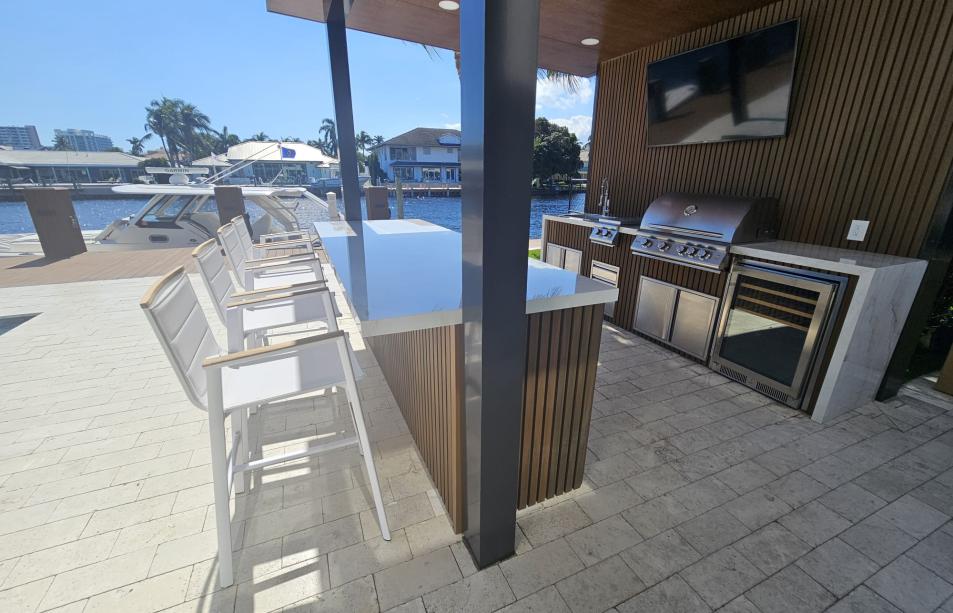 Small imitation wood pergola with outdoor kitchen
