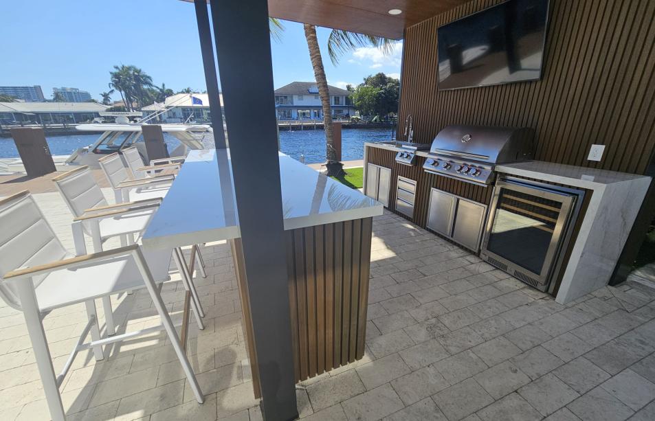 Small imitation wood pergola with outdoor kitchen
